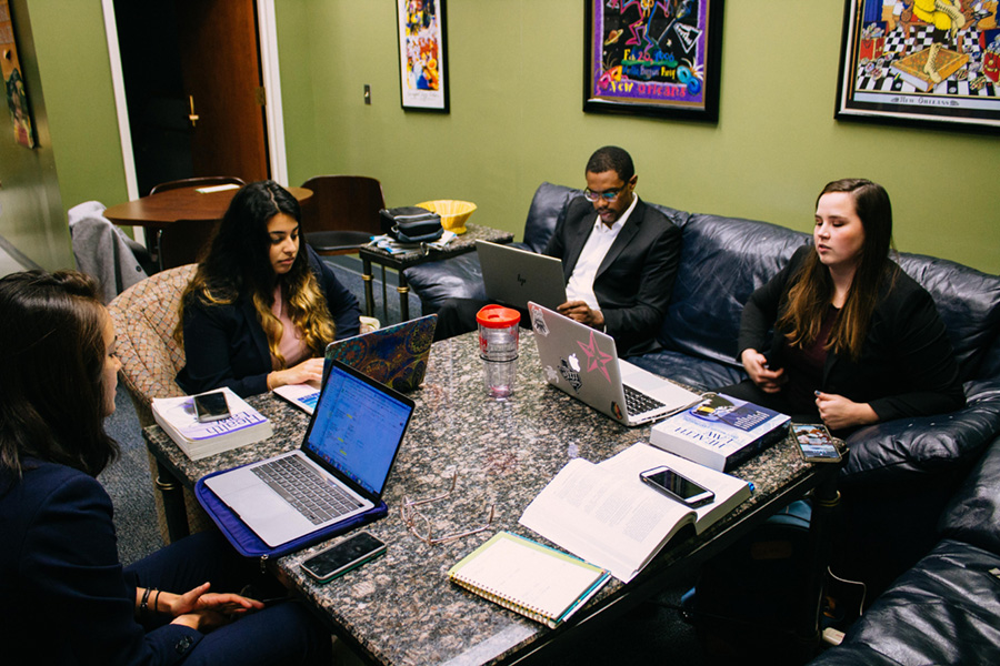 group of students working at computers in one of Tidewater's student loungesd