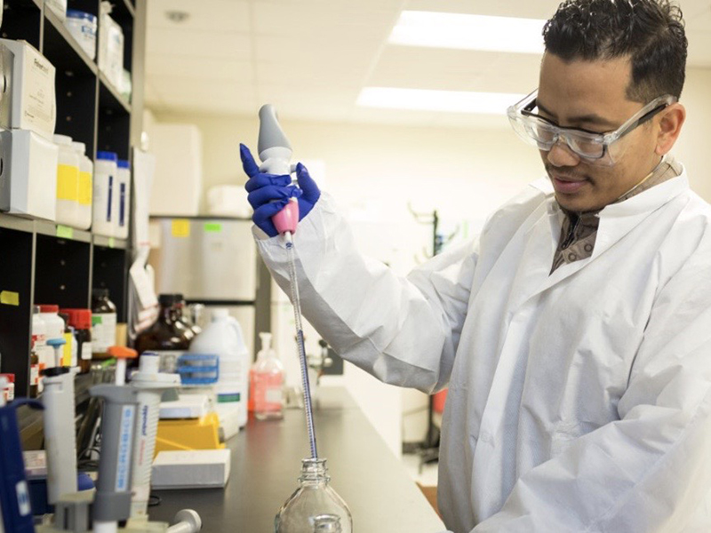 photo of Dr. Sherchan in a laboratory