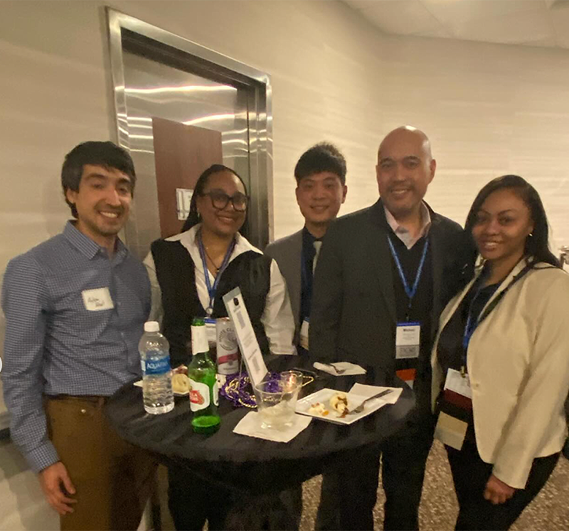 group of hpam alumni at a networking event