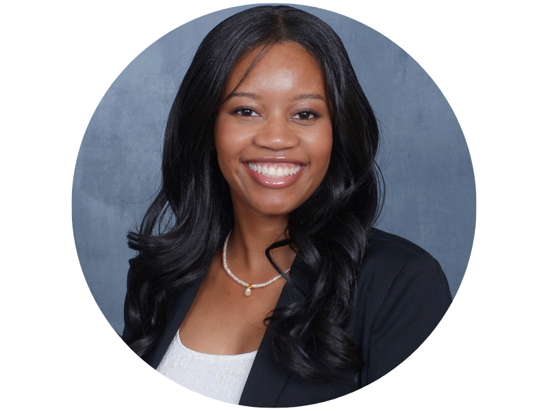 Monica Nyang'oro headshot, smiling broadly, looking directly into the camera