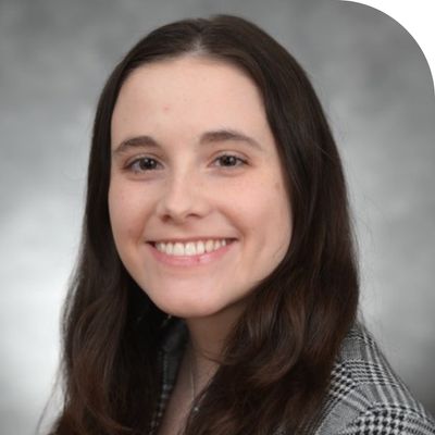 Alexandra Mack smiling,headshot