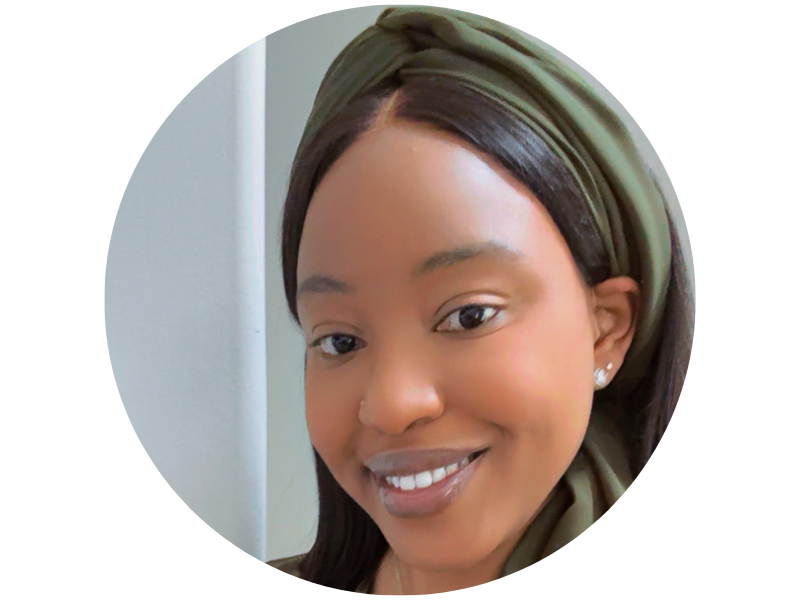 Diene Kaba headshot, smiling, wearing a green hairband