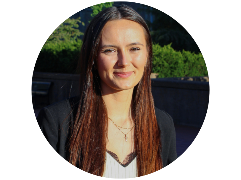 Isabell Nowacki, outside in a park, smiling