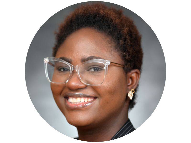  headshot, wearing glasses and smiling