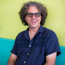 Derek Bridges, smiling