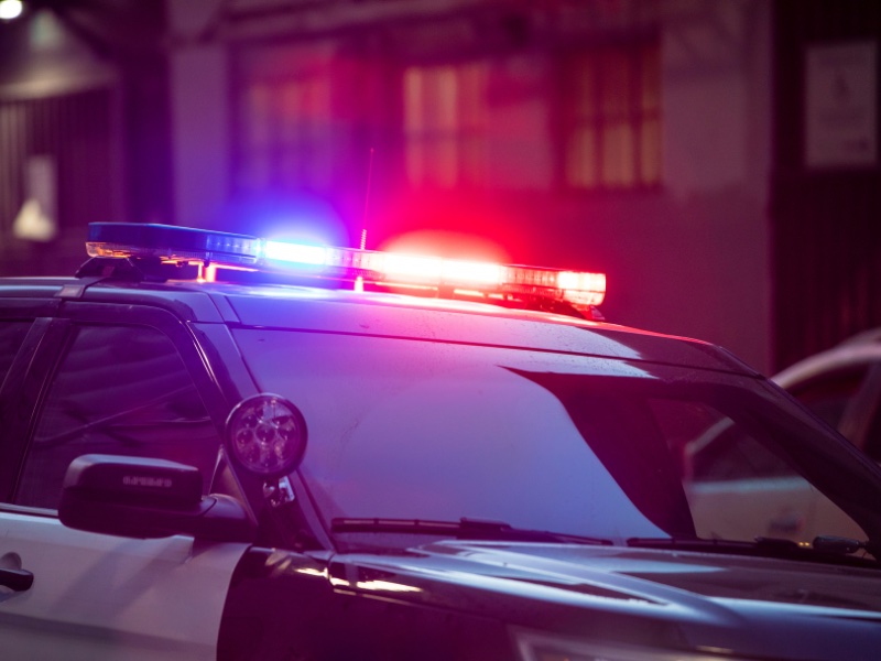 Police car with flashing lights