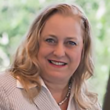 Janel Fielding, headshot, smiling at camera