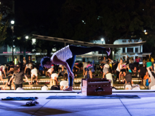 Valerie McMillan doing yoga instruction