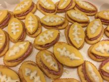 Cheese and crackers in shape of footballs for Super Bowl party